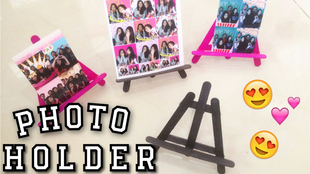 no need to buy a frame, use a Popsicle stick to make your own photo holder VERY EASY and cheap doe i used 7pcs popsicle stick each photo holder.