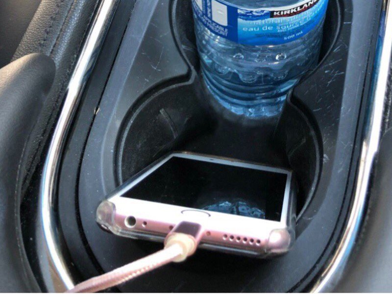 Woman in her 70s gets driving ticket for charging iPhone in cup holder