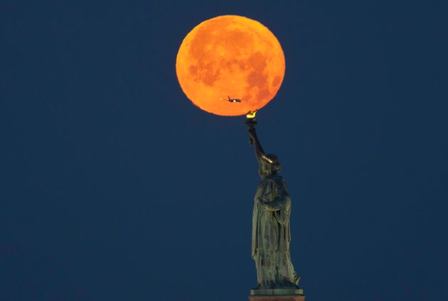 In Pictures: Saturday’s Strawberry Moon Lit Up Iconic Landmarks Across The World